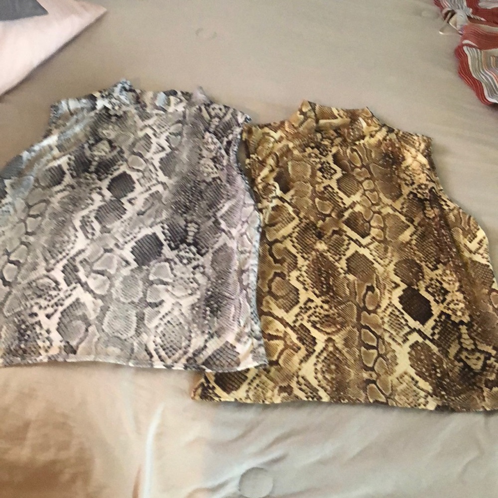 2 animal print blouse Size M..